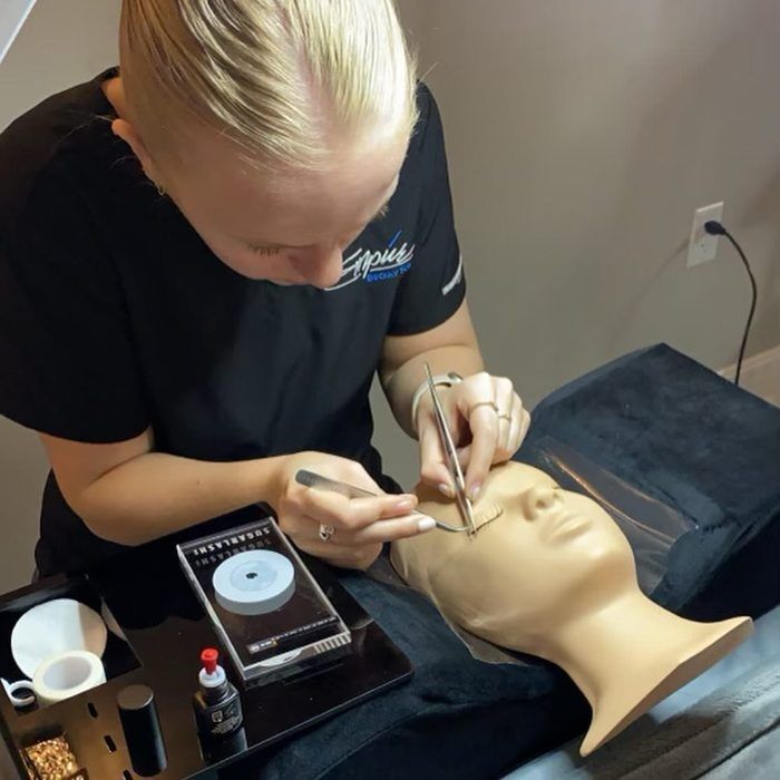 Student practicing lash extensions