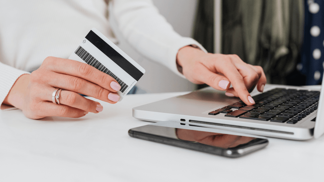 Financial reconciliation with calculator and documents