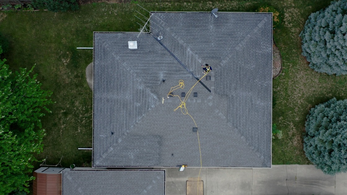 Aerial view of a roof rejuvenation treatment being applied