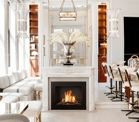 A HearthCabinet ventless fireplaces in a luxe looking living space, designed with elegant all white decor