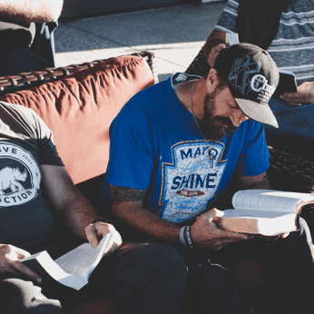 Veterans reading the bible seeking guidance. Finding new purpose in Christ. Healing for PTSD and Addiction