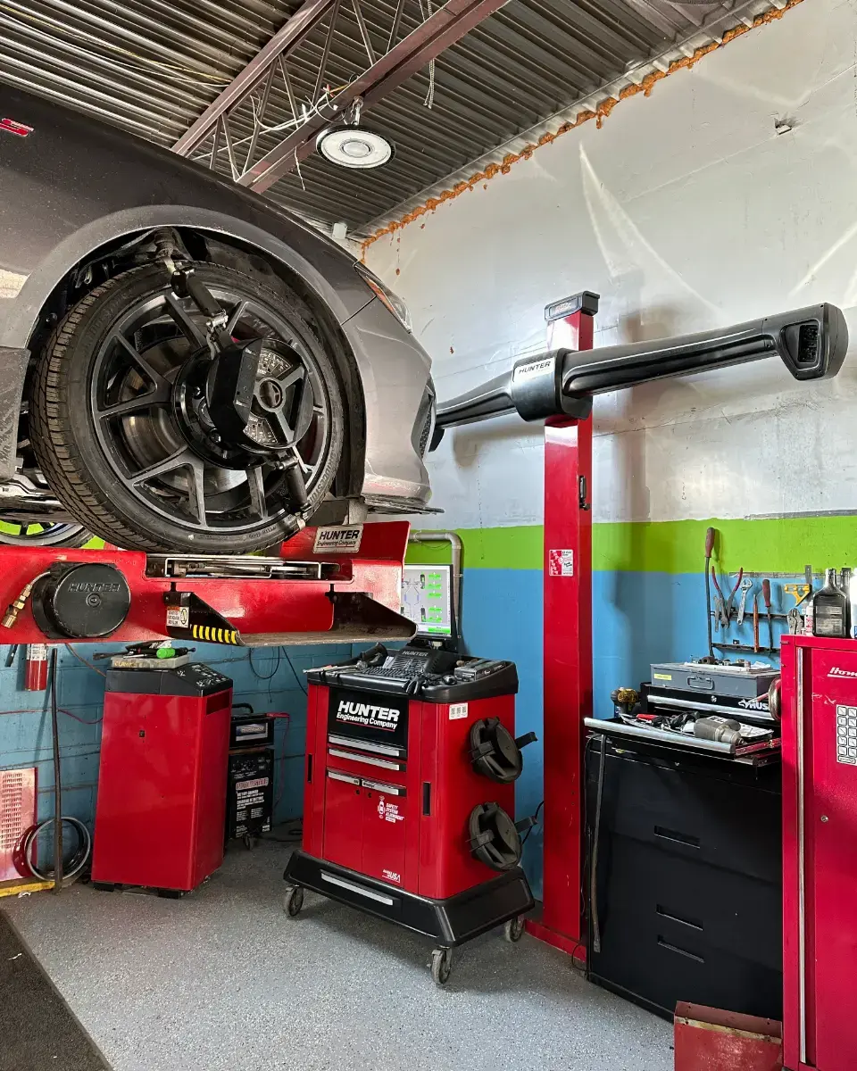 Hunter wheel-alignment equipment with targets fitted to a vehicle at Green Tires