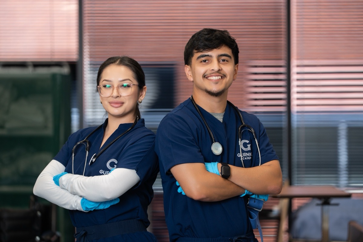Two Gurnick Academy vocational nursing students on campus
