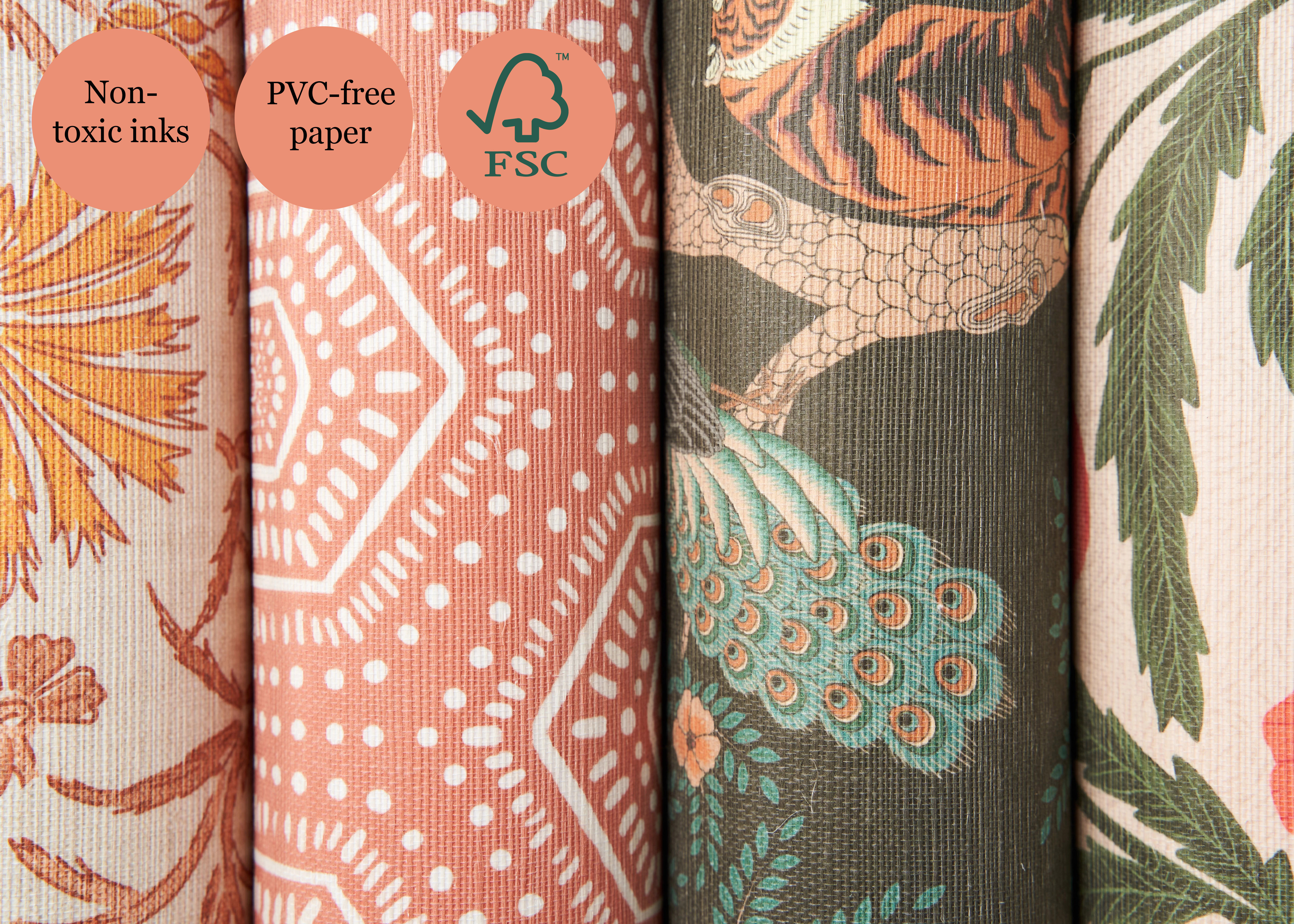Rolls of wallpaper with text stating "non-toxic inks, PVC-free paper" and FSC logo