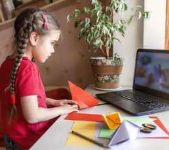 Girl playing with paper