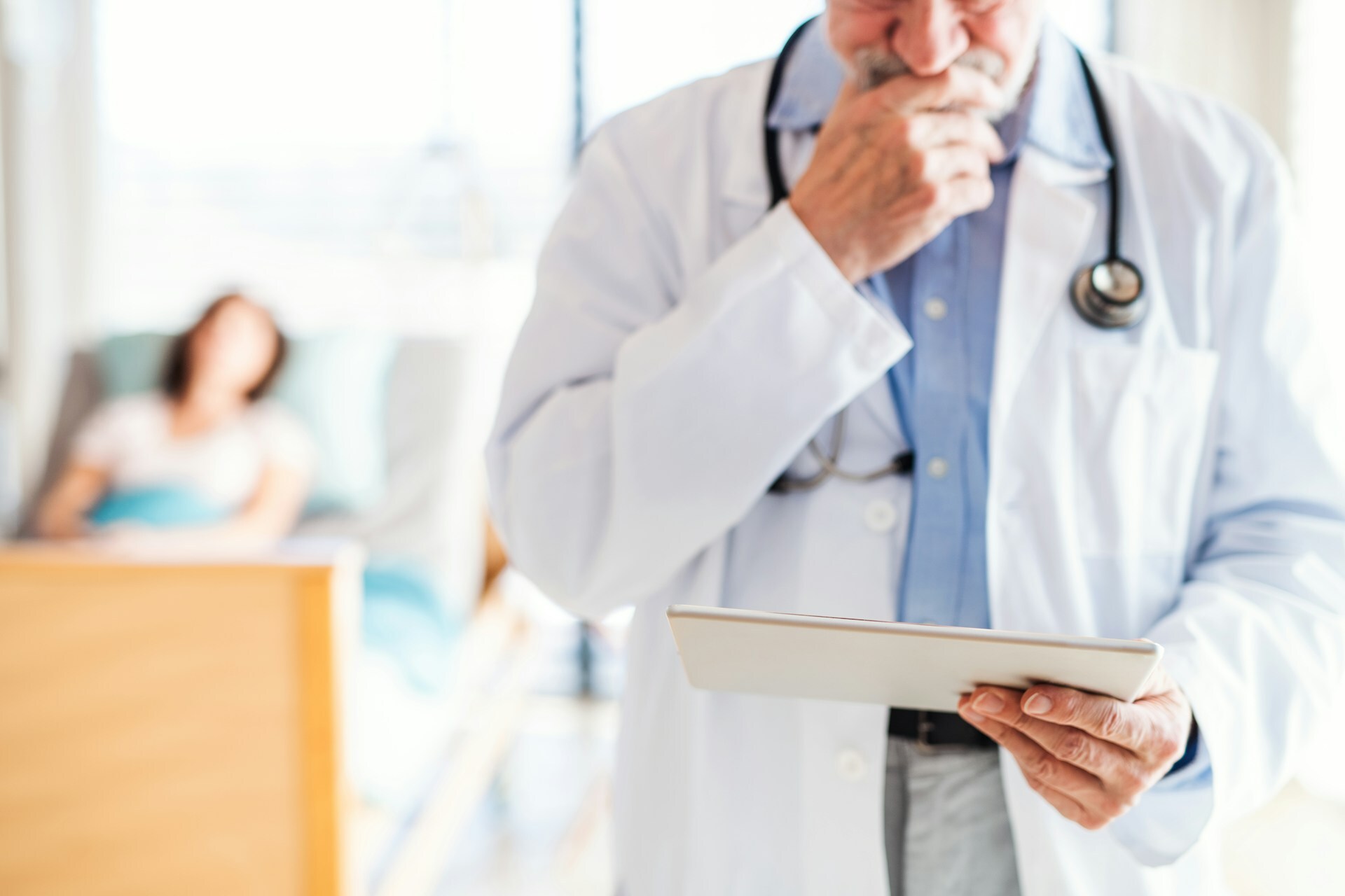 doctor reviewing patient's chart