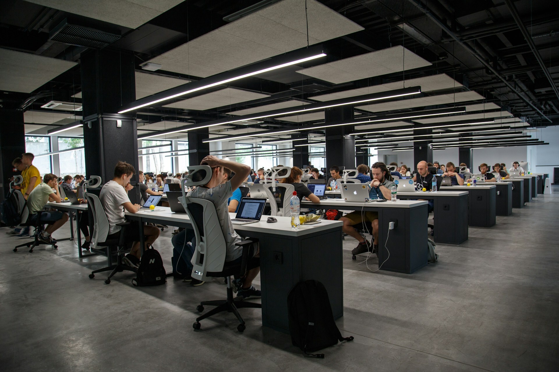 open office with employees working 