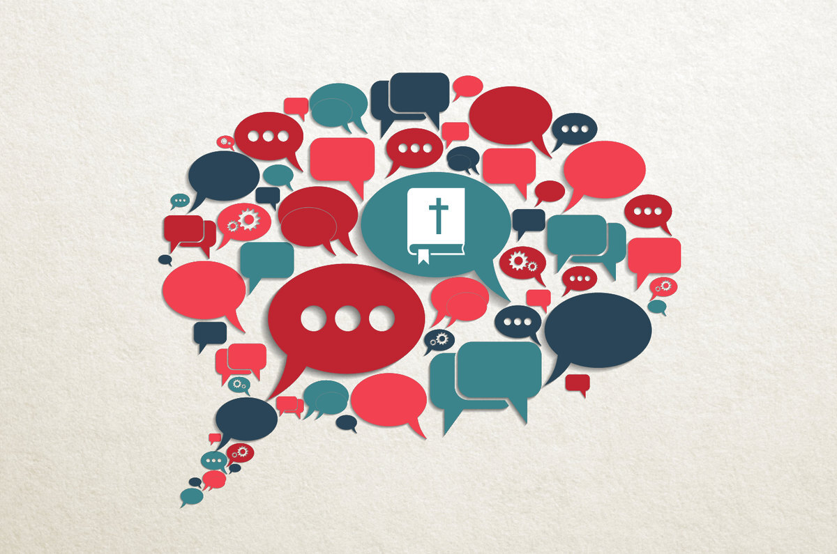 A cloud of speech bubbles around an open Bible