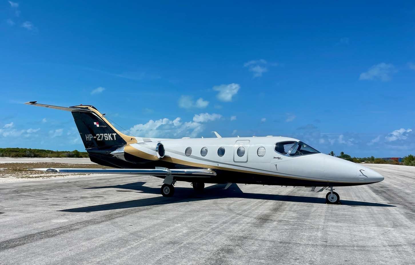Hawker 400 XP parked on the runway