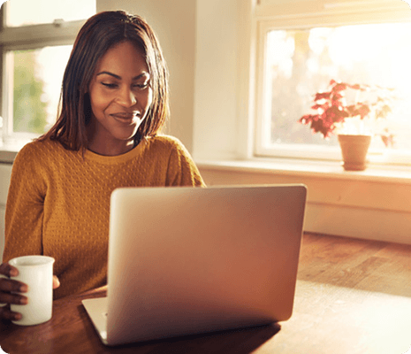 Student using a laptop at home