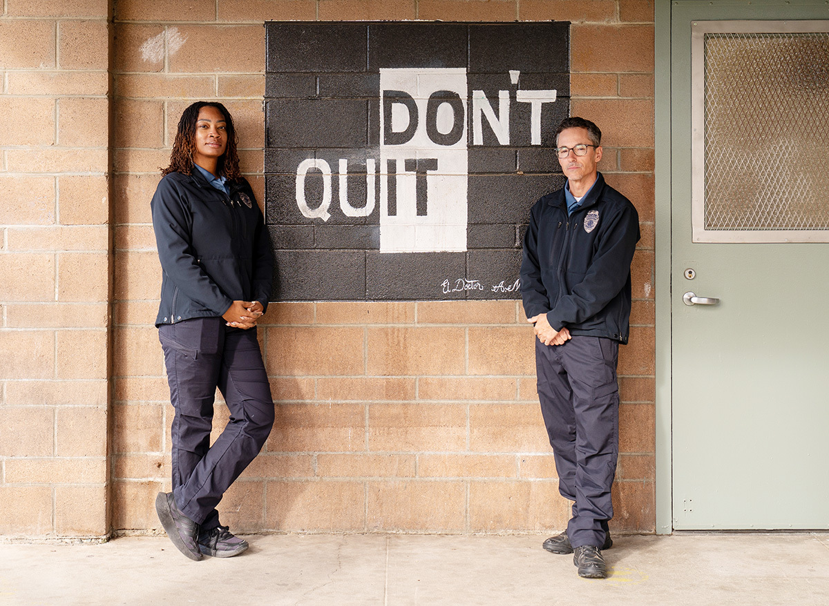 A female and a male Deputy Probation Officer talking