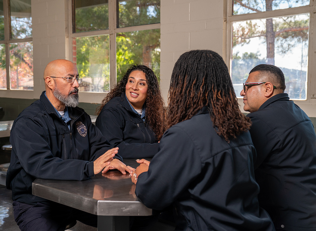 Two female Deputy Probation Officers talking