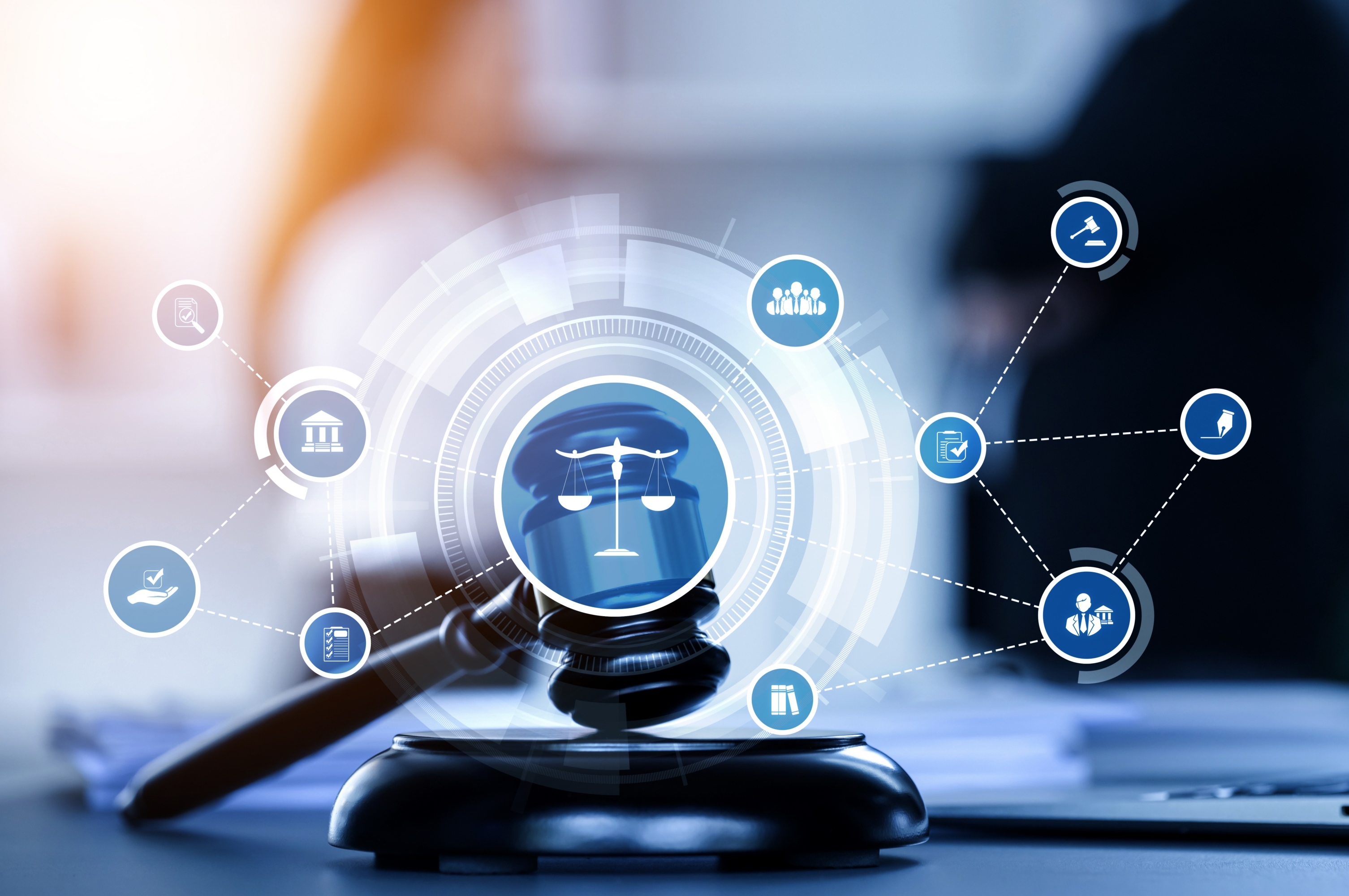 Digital illustration of legal and justice concepts featuring a gavel, scales of justice, and interconnected legal icons representing court, documents, compliance, and legal services in a modern office setting