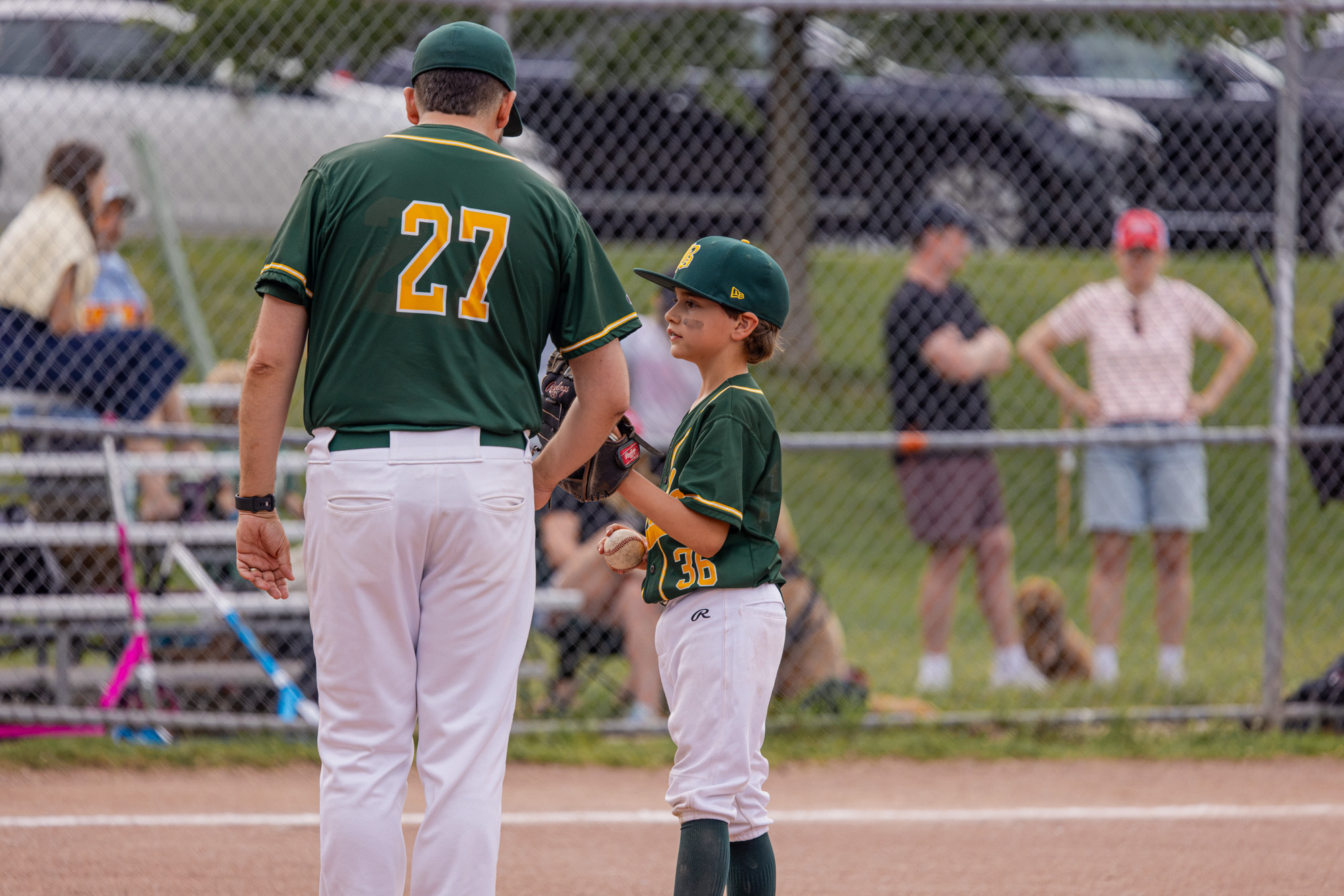Bloordale player smiling while talking with Coach Ryan