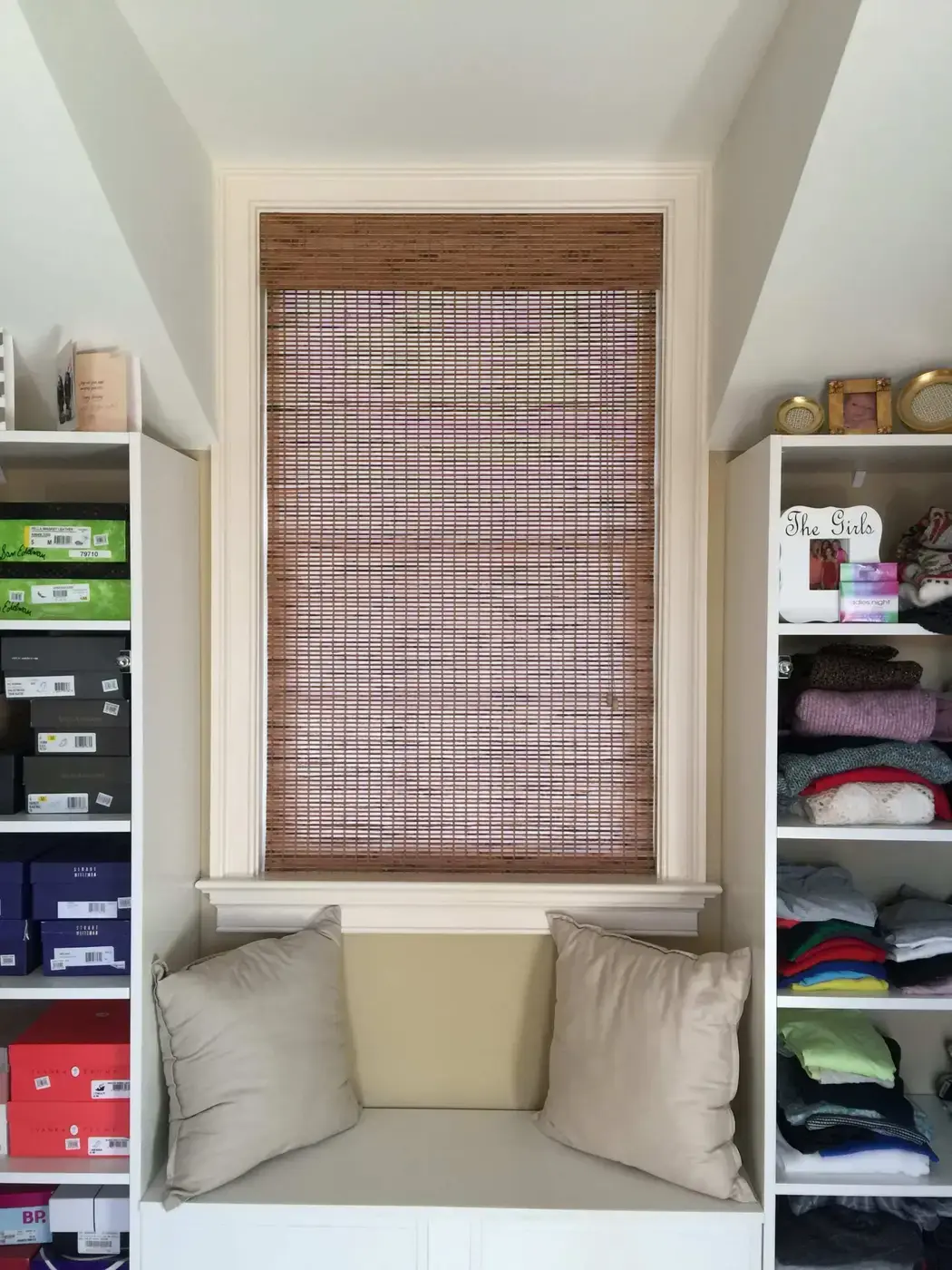 Woven wood shade on a window seat