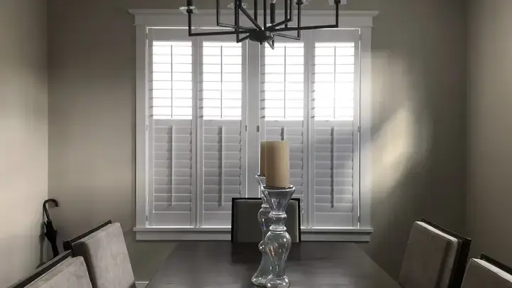 White plantation shutters in a dining room