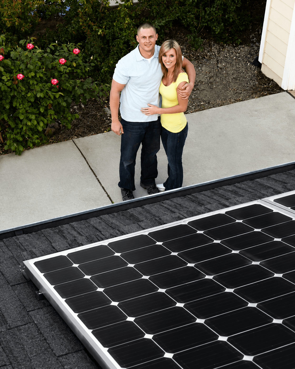 Homeowners with their newly leased solar system