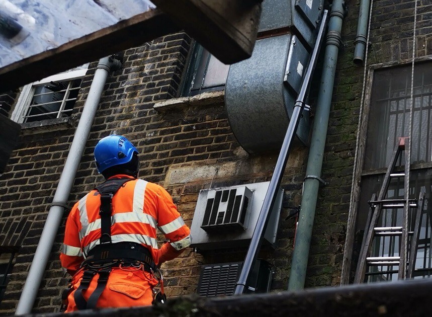 Summit Property Maintenance rope access technician at work
