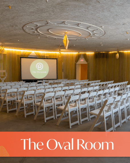 Large multifunctional space with modern aesthetic. Seats and open area for guests.
