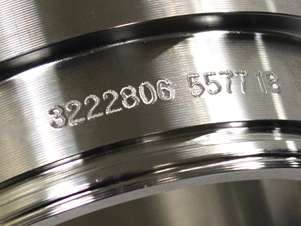 Dot peen marks surviving powder coat on heavy-duty components