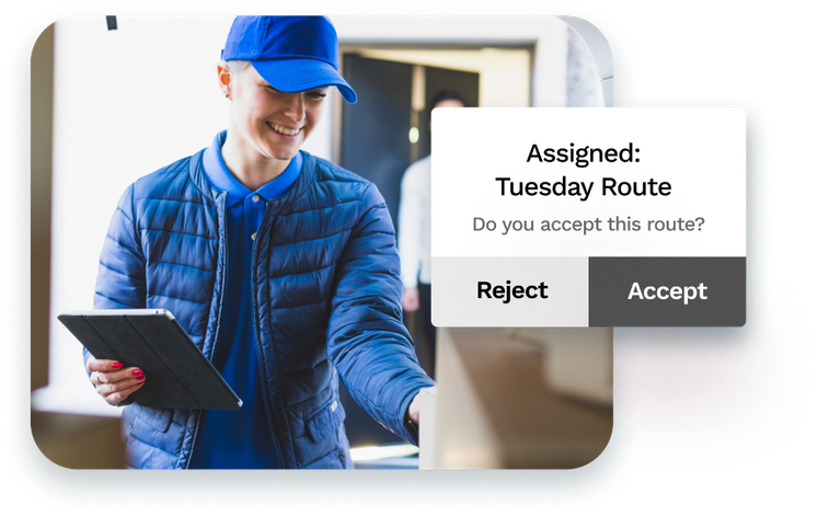 A message asking if a route driver will accept or reject a route, with a smiling delivery driver holding a tablet in the background.