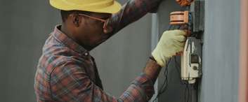 electrician installing new panel connections