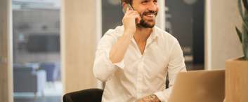 Consultant on phone listening to address elecrrical needs.