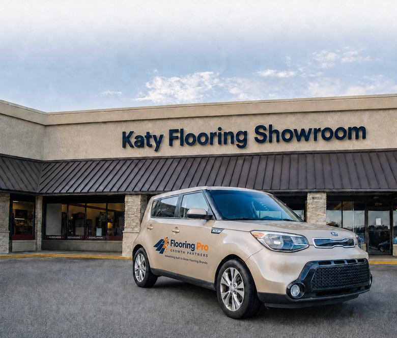 Flooring Pro branded vehicle at a client storefront