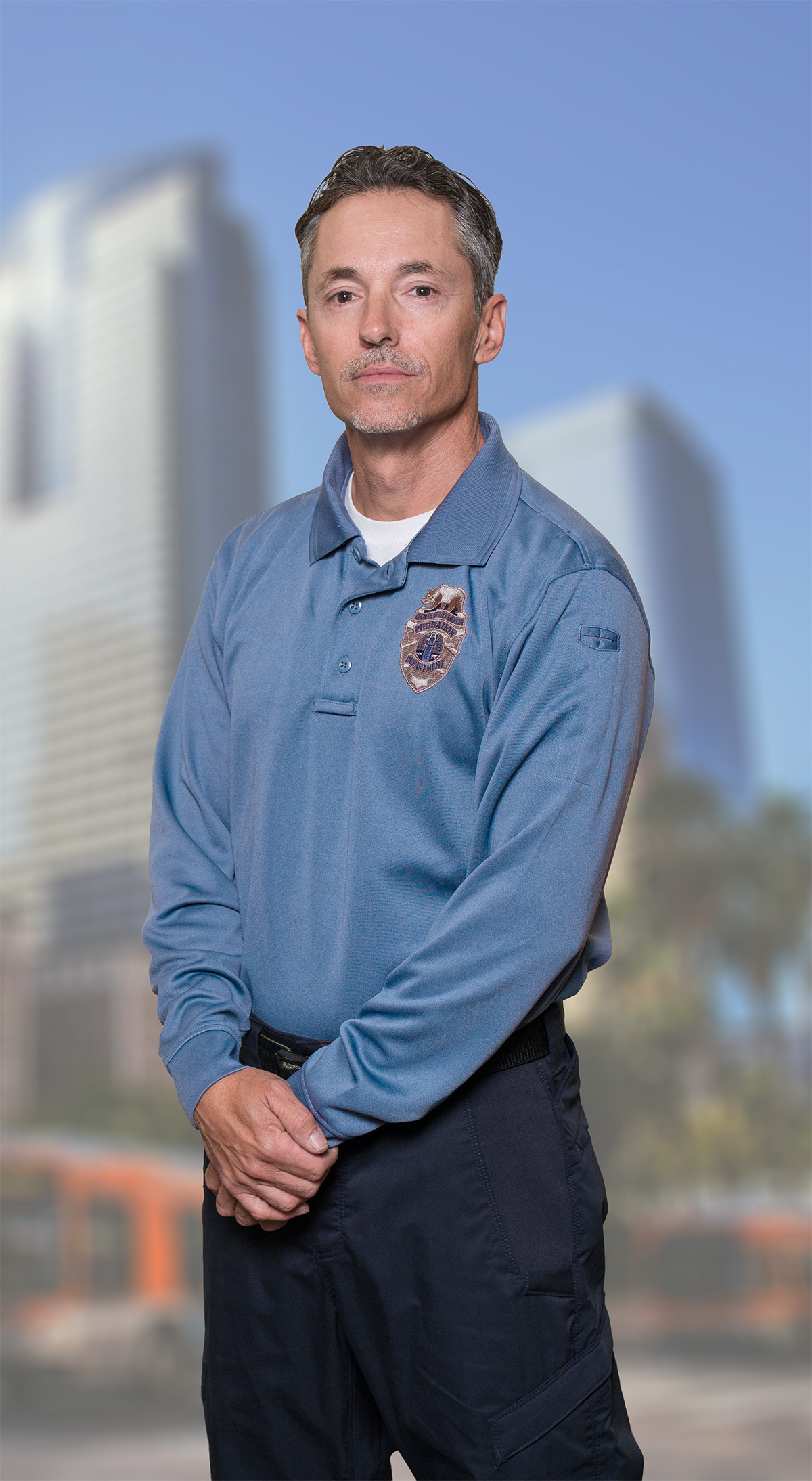 Male Deputy Probation Officer with downtown LA in background