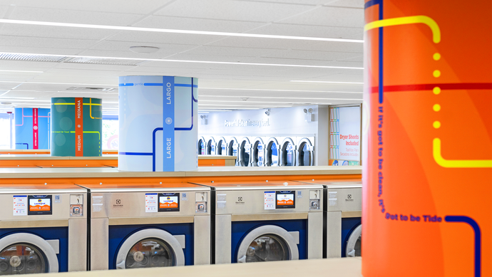 Smart washers inside of Belmont Cragin Tide Laundromat.