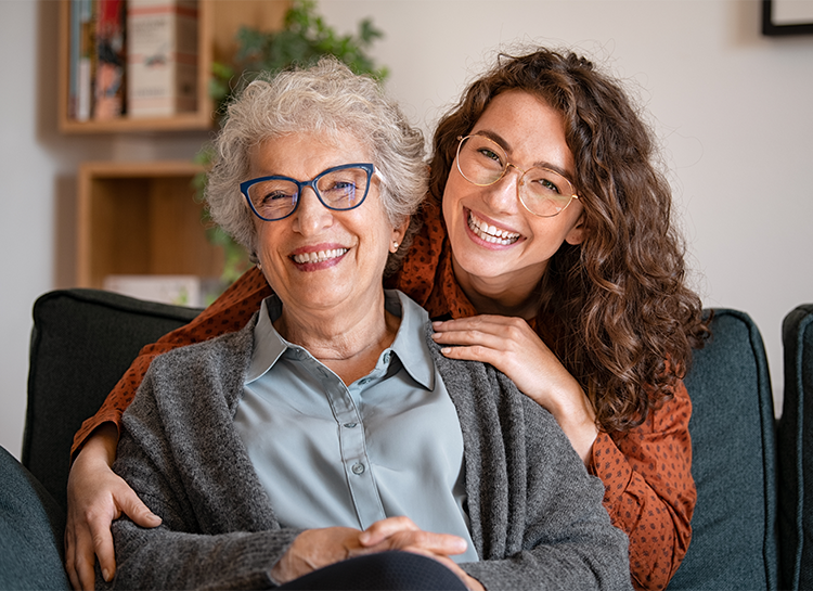 A smiling home care taker and resident