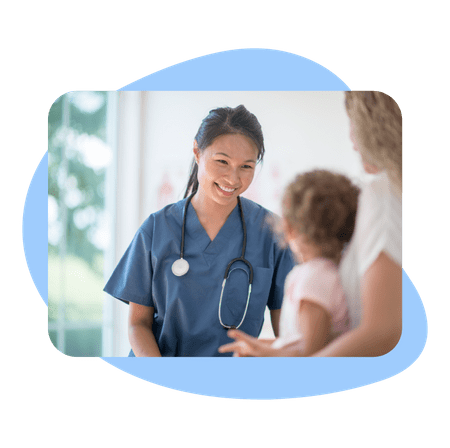 Medical Assistant smiling at her young patient
